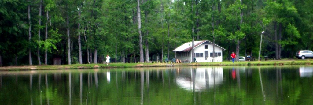 Camphouse from the pond by Mary Margaret Howard