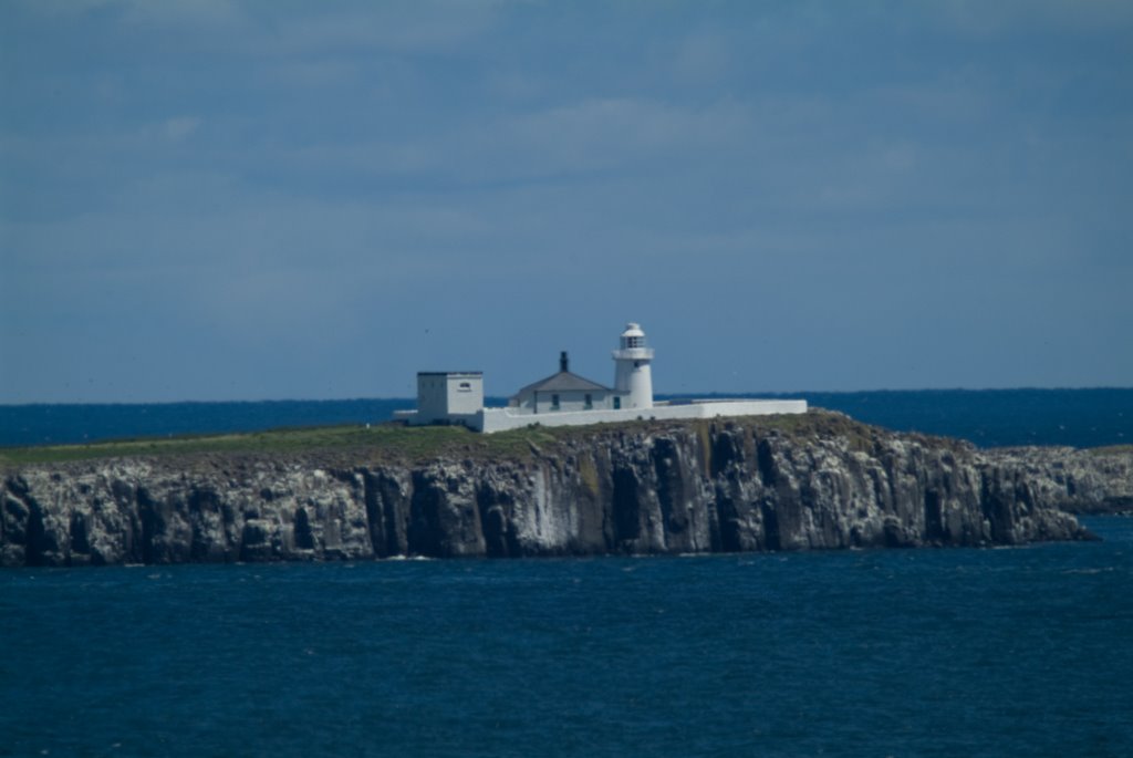 View out to the Farne isles from Bamburgh Castle by Derek Haden