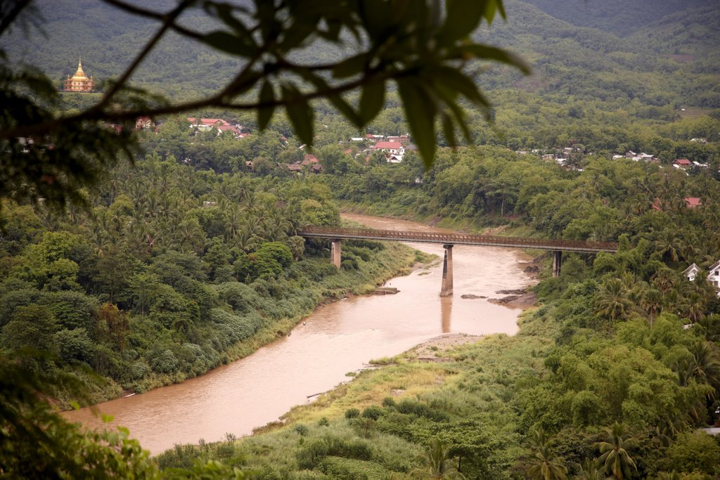 The old iron bridge in Luang Prabang by Steven Witkam