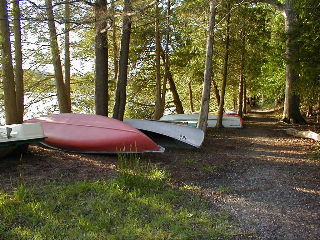 Canoes by Dunham Lake by njtlandry