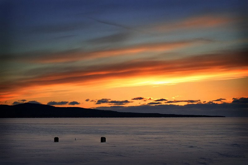 Ice Shacks on Harmony Bay by Travis Favretto