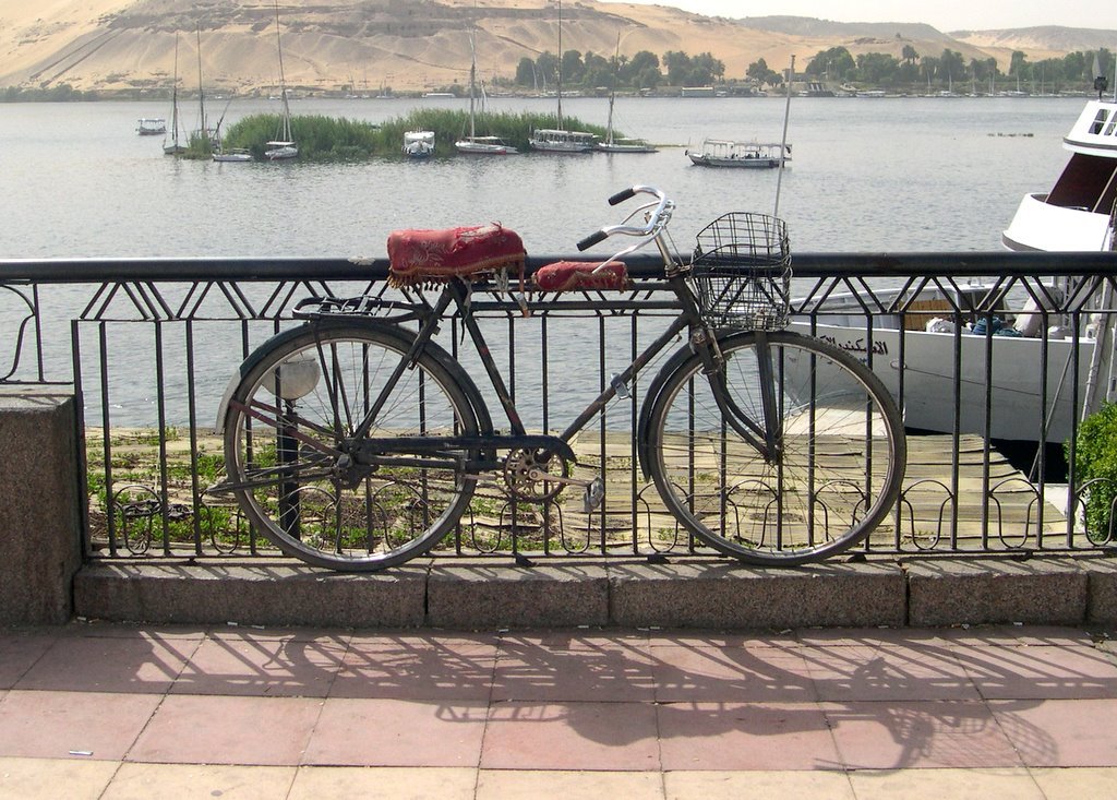 A bike on the Nile corniche in Aswan by Mimmo Feminò