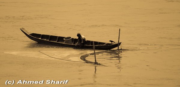 Fishing in the Karnaphuli, as seen from Kalurghat Bridge, Chittagong, Bangladesh by Ahmed Sharif