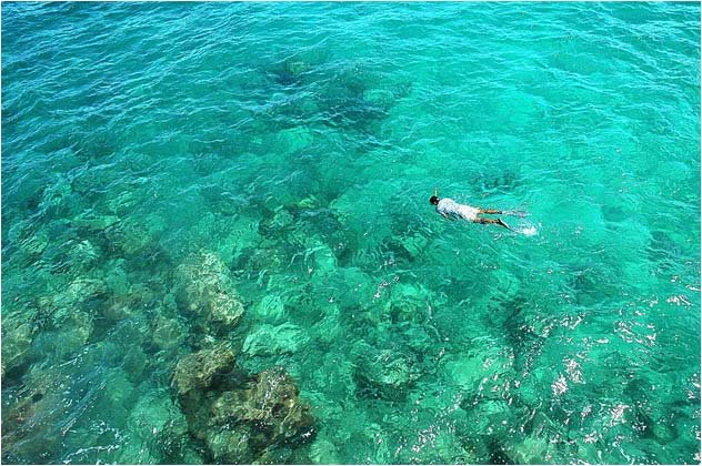 Floating on crystal clear water,Sunset Beach Hotel,2005 by Tianzhan