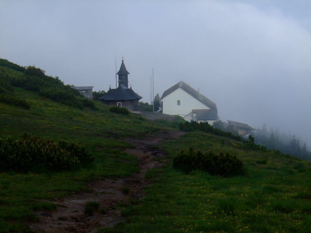 Fog on Ceahlau near monastery by Gabriel Avramovici