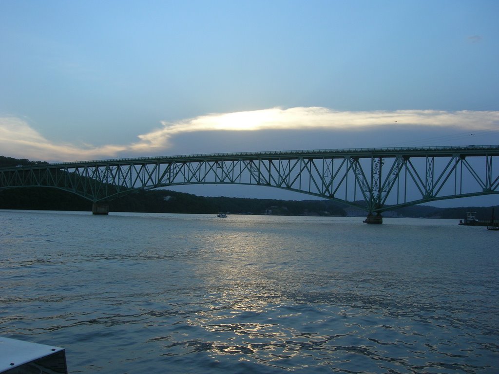 Bridge and storm clouds by mrbitter