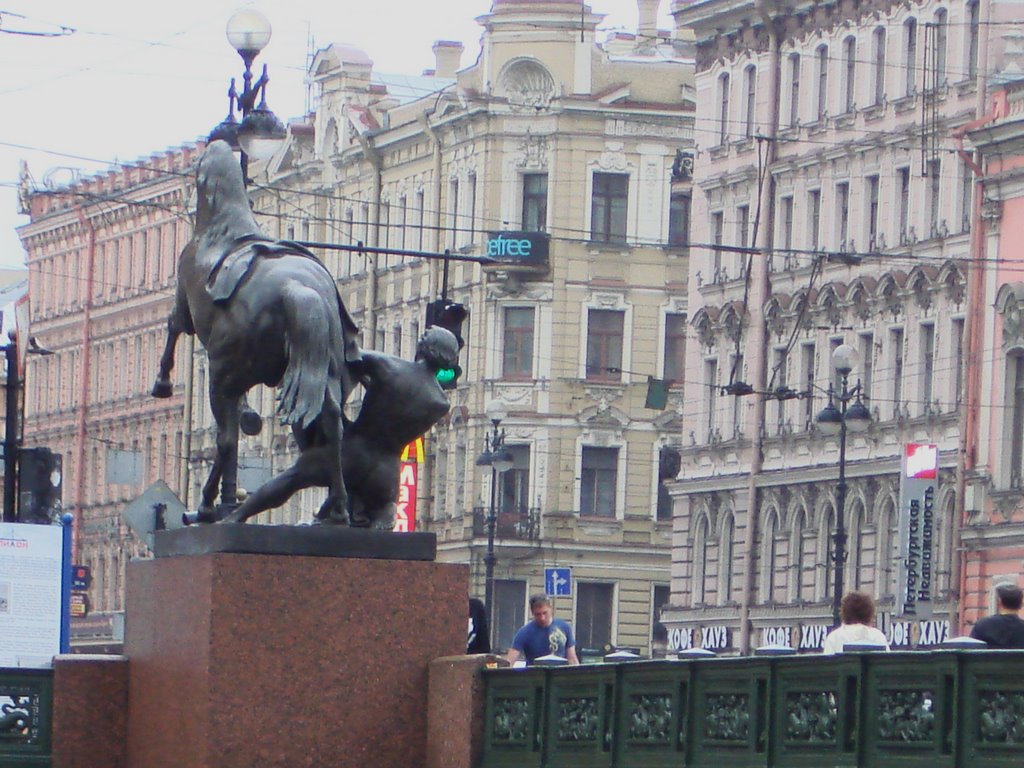 Metal sculpture of a man taming a horse. Nevskiy prospekt. by Victor Misael