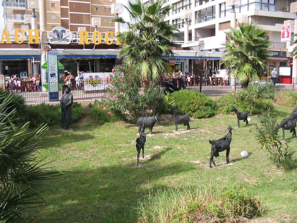 Metal goats and goatherd, Benidorm by simon_uk