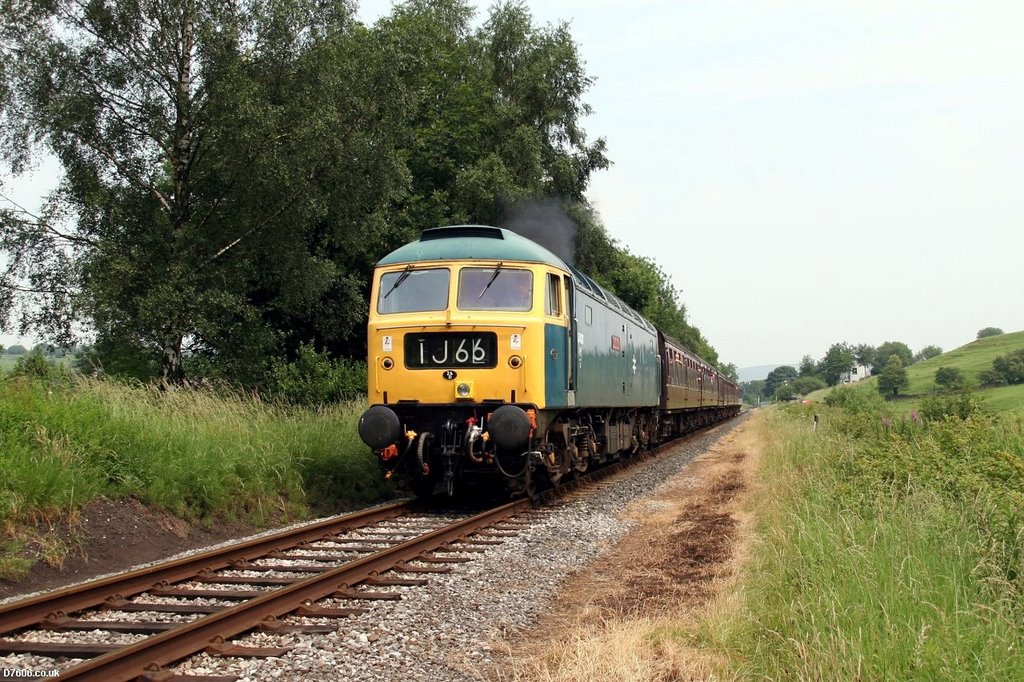 A Class 47 diesel departs to Bury from Irwell Vale Station by D7606.co.uk