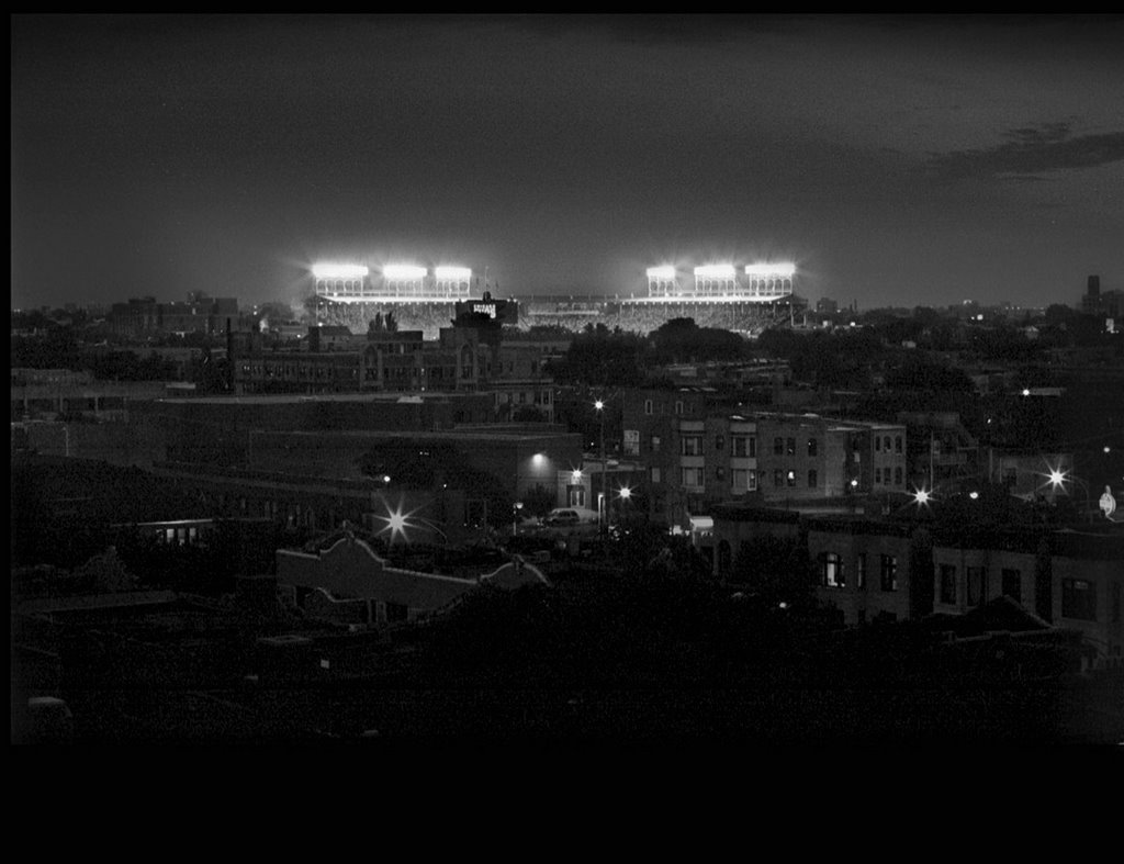 Wrigley Summer Night (view from 732 Bittersweet Pl.) by Larry Koss