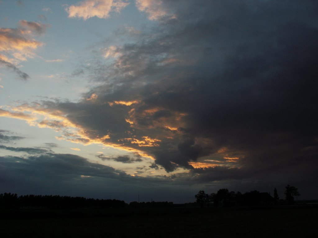 Cloudy sunset by Tjeert.Mensinga ©