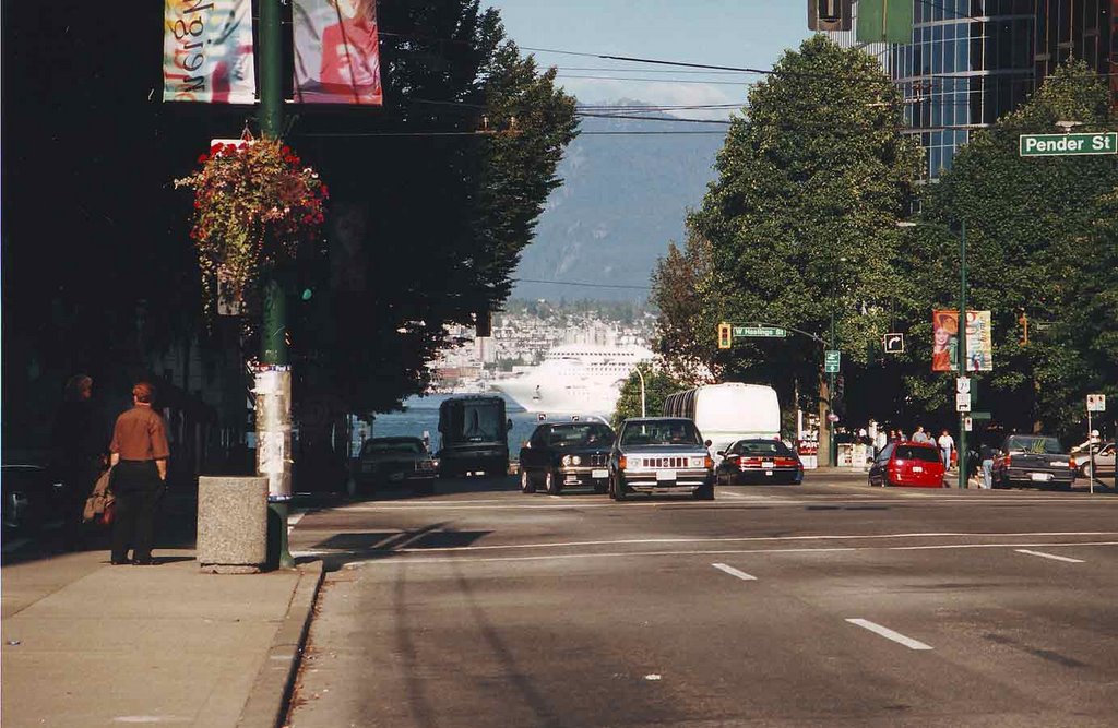 Burrard St. and a liner sailing through the Burrard Inlet by Guilherme Coelho