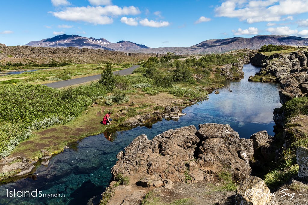 Girl drinking water by Rafn Sigurbjörnsson