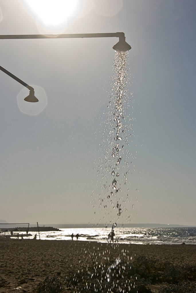 To rinse of the salt water, Malia, Crete, Greece by Wim Janssen