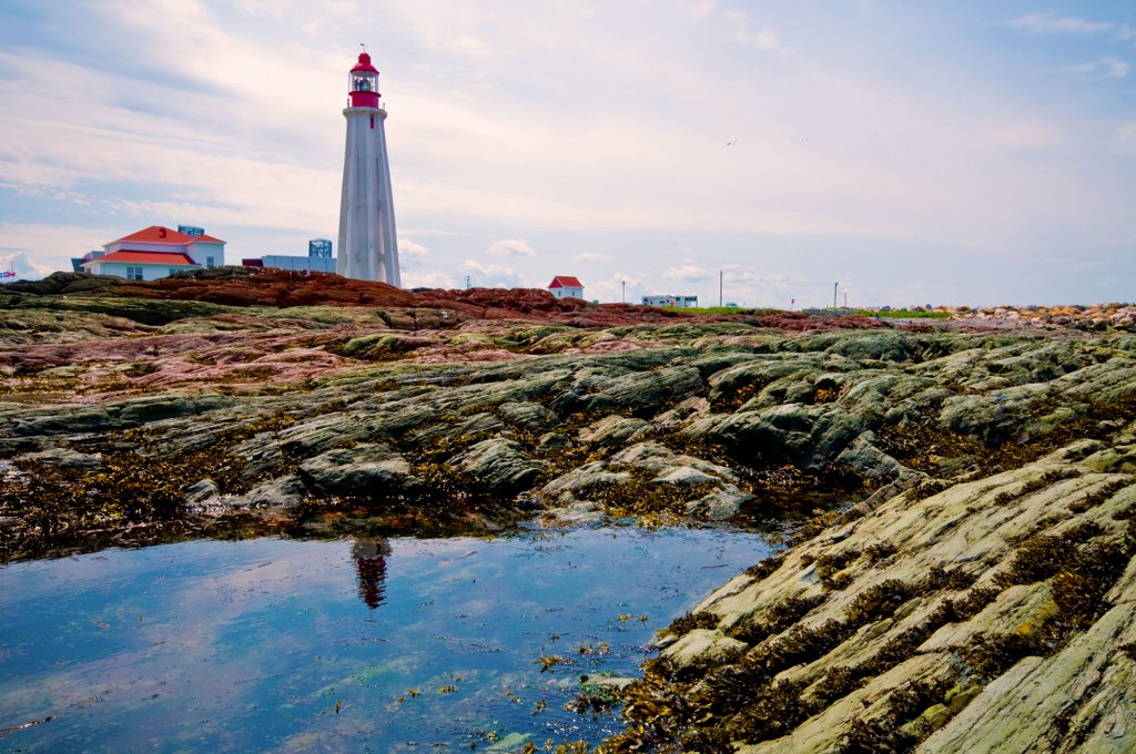 Pointe-au-Pere Lighthouse from the rocks by DigitalSorceress