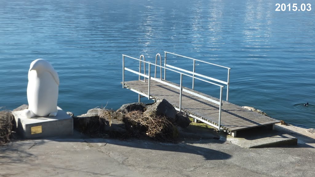 White Sculpture and Small Bridge at Lake Geneva by Irmantas Kanapeckas