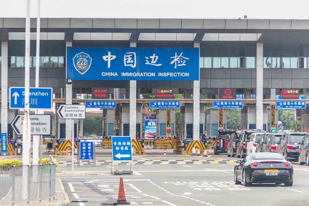 Crossing the border from Hong Kong to Mainland China by Scott Gore