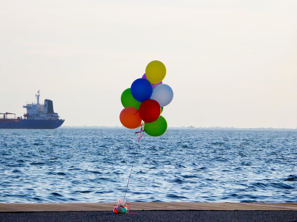 The big blue ...red green orange yellow white balloons by chris Coco