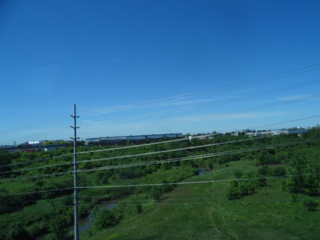 Looking out the left window on a trip from Union to Pearson, 2015 06 06 A (744).JPG by OldYorkGuy