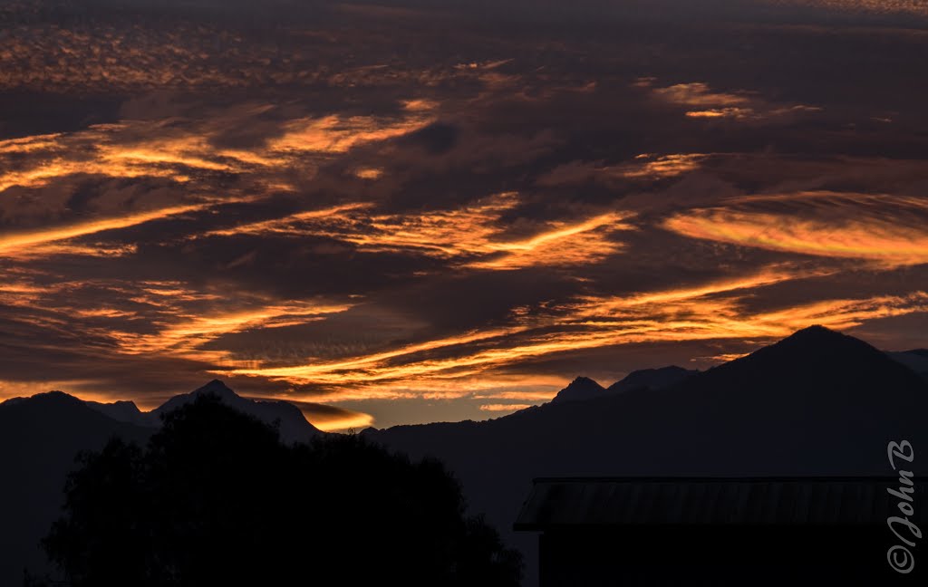 Sunrise over the Andes mountains by John Bankson