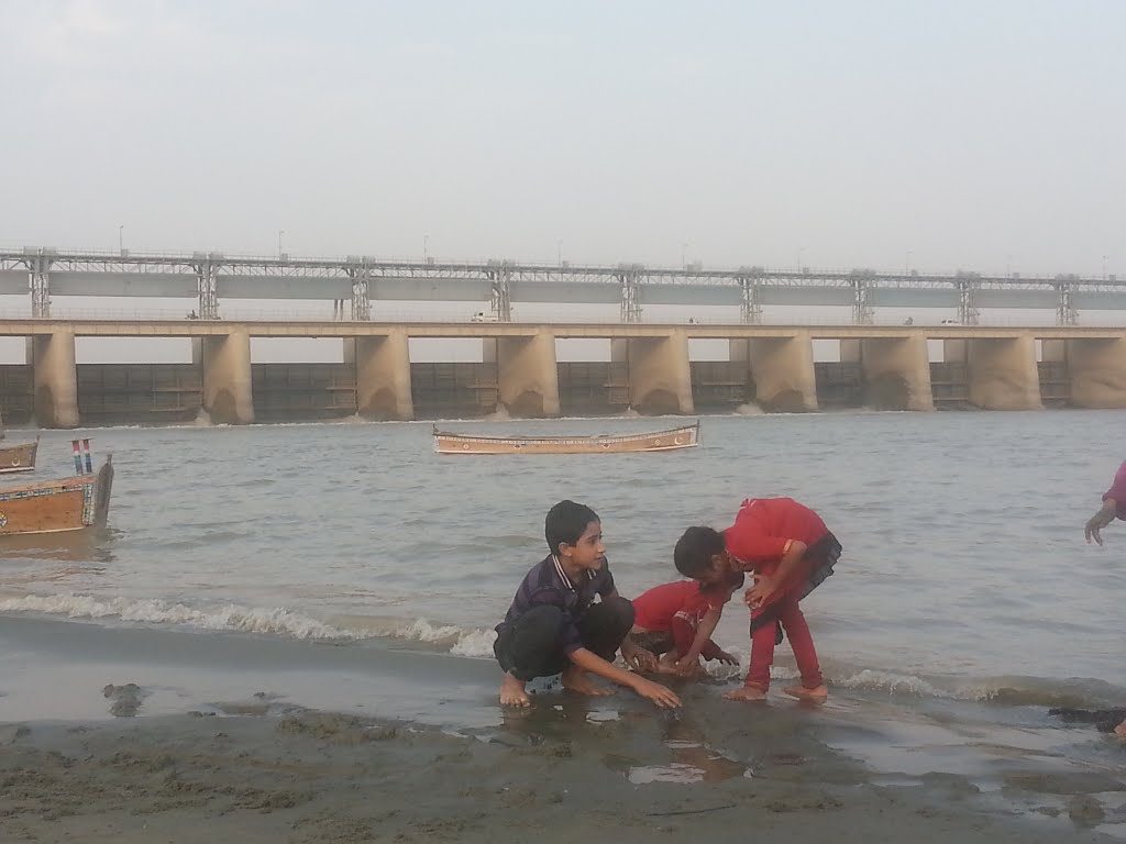 Children and Down stream of Kotri Barrage by Nawaz Ali Lakho