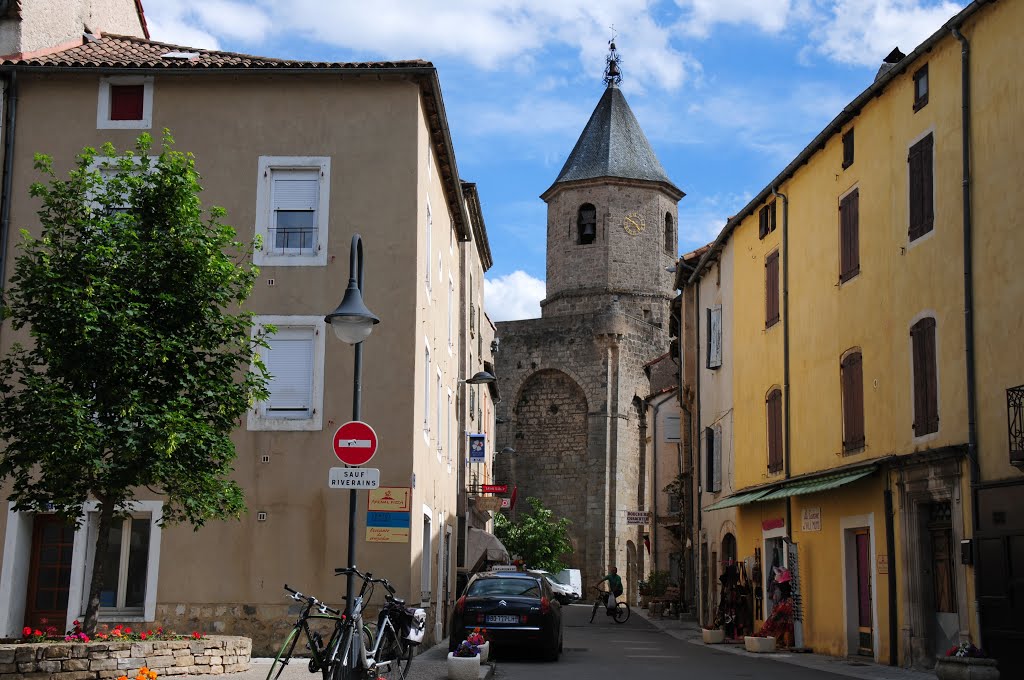 Church Saint-Pierre at Nant, as seen from the central squre with Mairie and Halles by Henk Monster