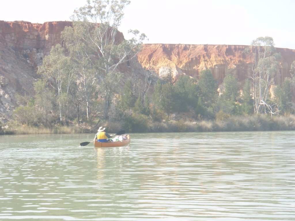 Canoeing near cliffs by greenangel