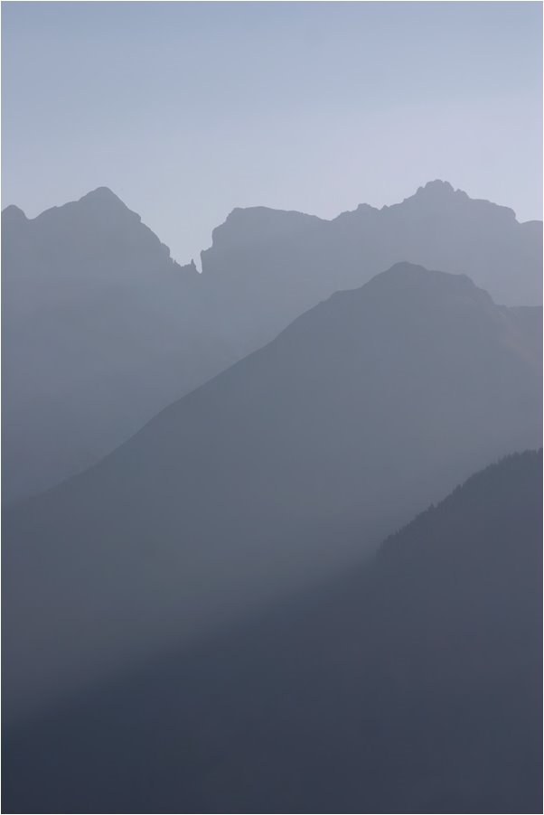 Foggy mountains viewed from barthlomaeberg by Robert Fritz