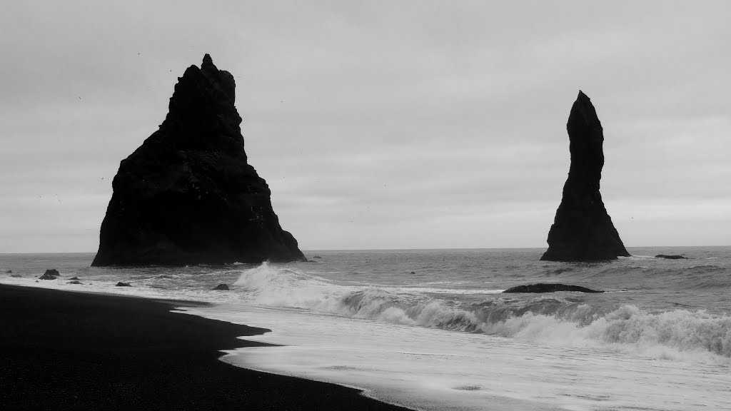 The black sand beach and sea mounts at Reynisdrangar, near Vik, Iceland by John Eby