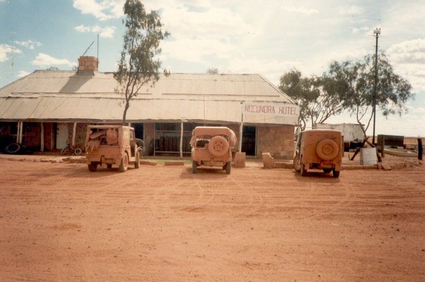 Thirst quencher at the Noccundra Pub on the way home from the 1984 East to West Simpson Desert crossing. by Mick Brannigan