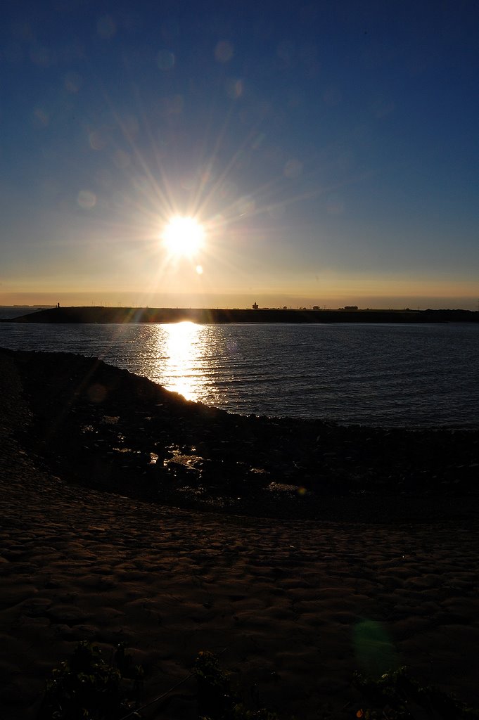 Evening sun over the old ferry harbour in Kruiningen, Netherlands by Andre Speek