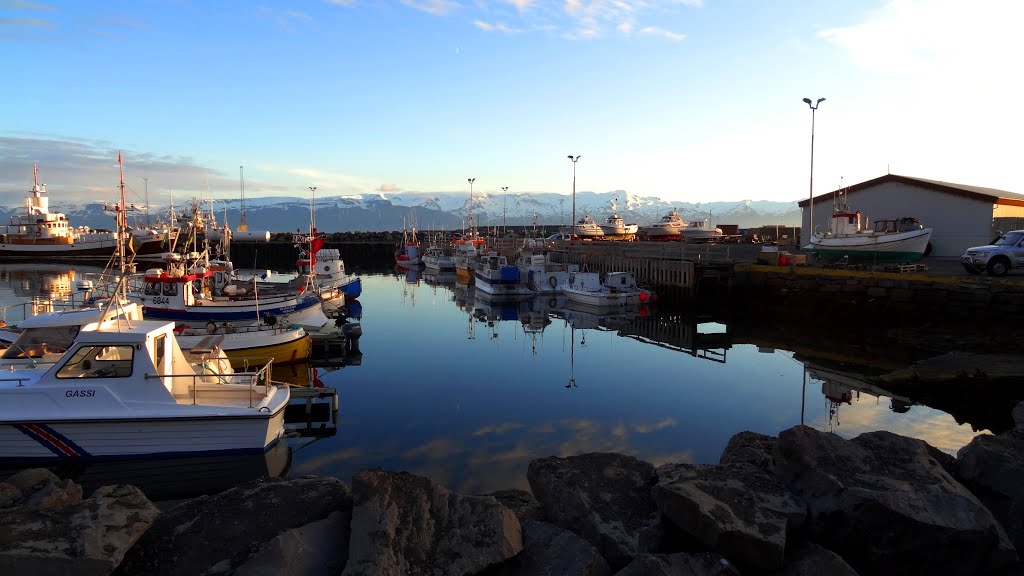 Ships in the port at Húsavík, Iceland by John Eby