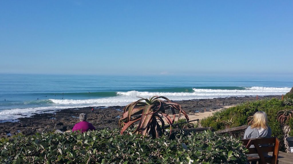 Morning surfers out at Super Tubes, J-Bay by John A Forbes