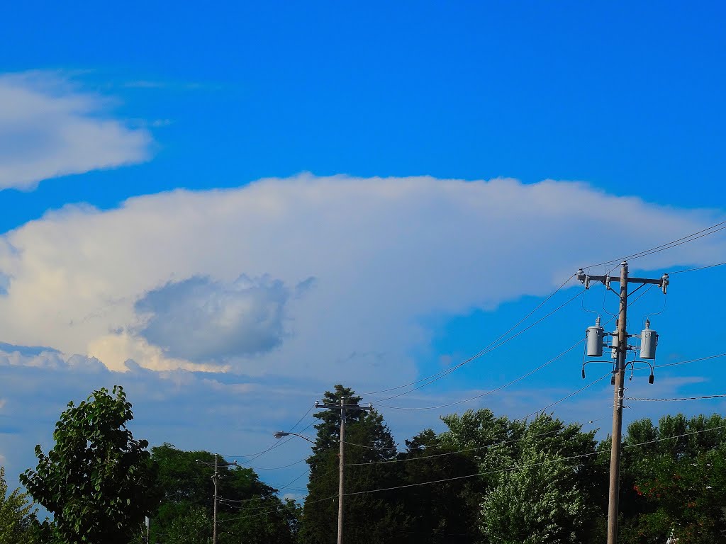 Cumulonimbus Incus in the Distance by Corey Coyle