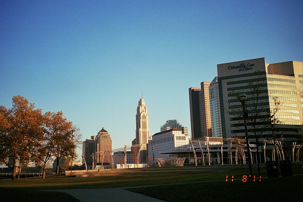 Skyline from the Main Street bridge with the Leveque prominent in center. The new Scioto River park's south end is here Columbus has been steadily improving its downtown river front.. (Nov. 2011) by miklospogonyi