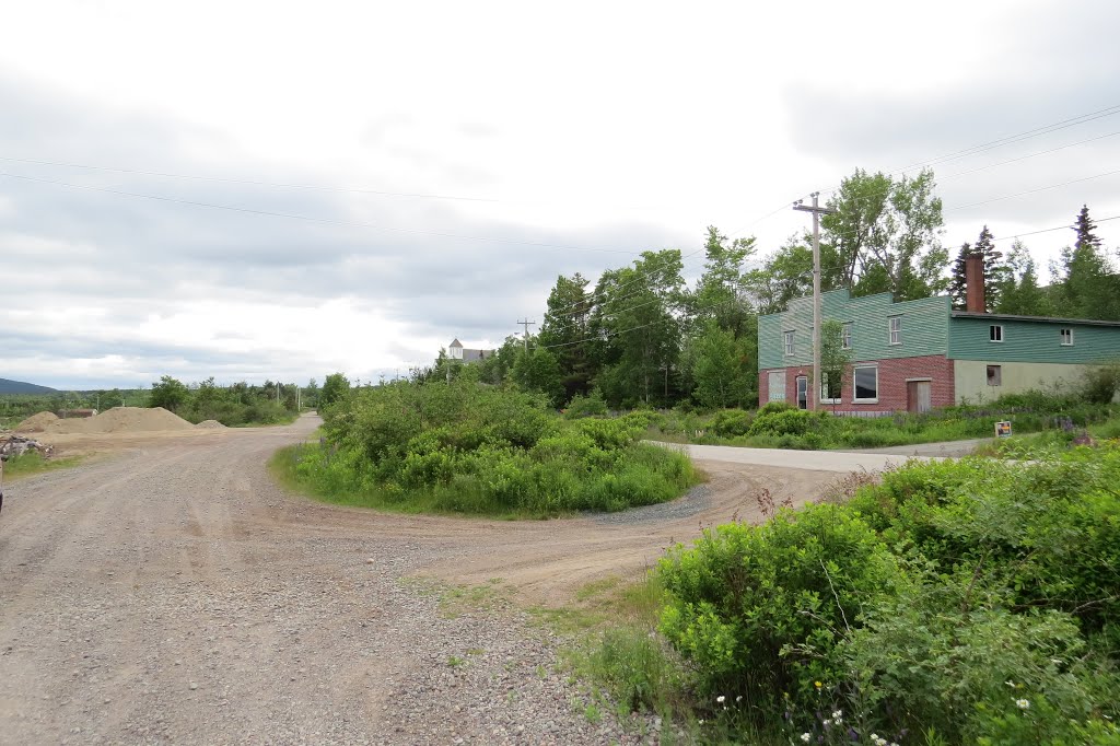 The path of the old Newfoundland Railway begun in 1882, completed in 1898, closed in 1988 is on the left. This railway spur line provided a local link for Bonavista Bay to St.John's. The station burned in 1978 and was not replaced. by Steve Manders