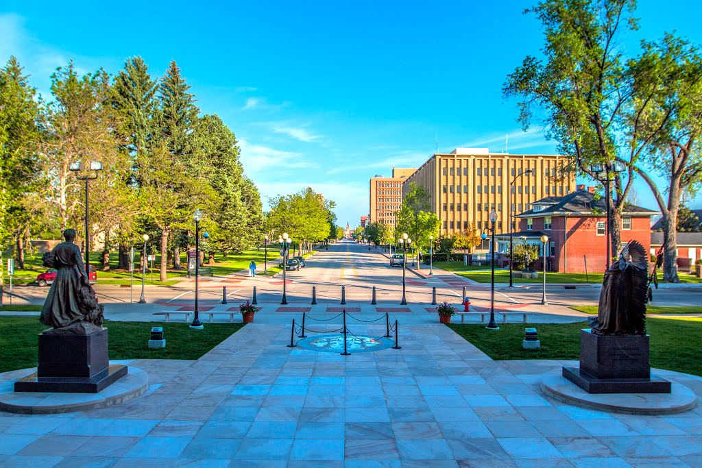 Viewing south-south-easterly, from the top step of the Wyoming State Capitol Building entrance (200 W. 24th St.) downwind at Capitol Ave., with the old Union Pacific Depot Building in the middle of photo. Cheyenne, Wyoming by Elifino 57