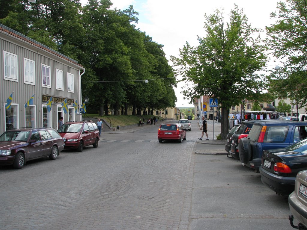 "Storgatan" with a view towards the city square in Nora, Sweden by Mattias B