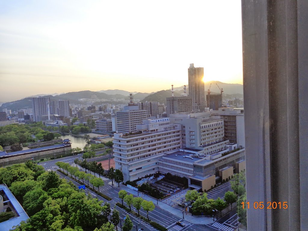 . Good Morning Hiroshima . Sunrise seen from our room . Royal Righa Hotel. by PM Velankar