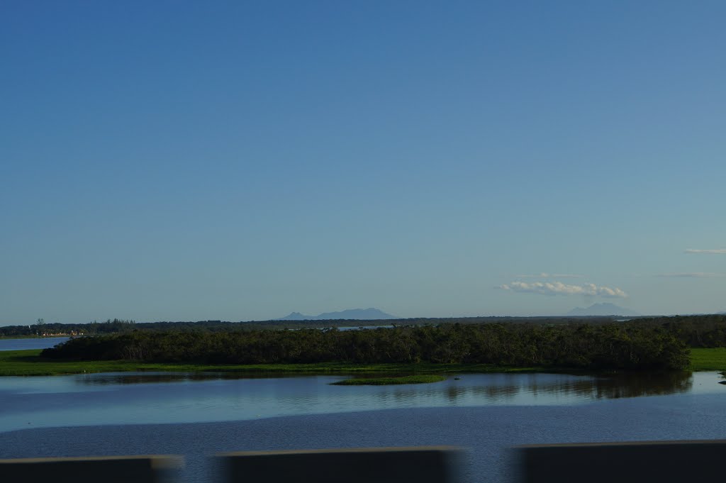 Ilha do Cardoso e Cananéia ao fundo - Ponte de Ilha Comprida - SP by Andre Pimentel