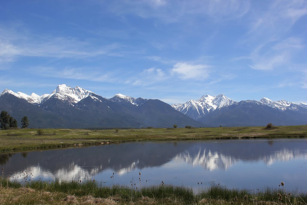 Mission Mountains reflection by DeEtte Fisher