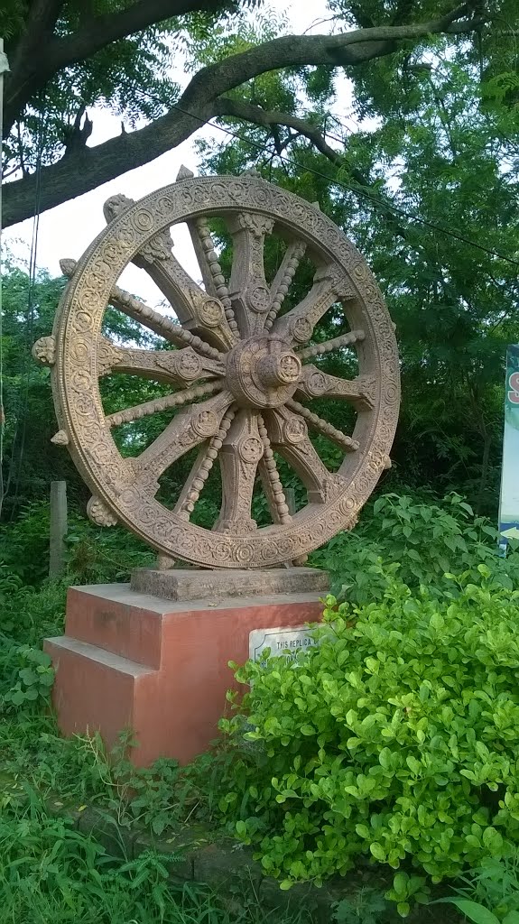 The Chakra, wheel of chariot replica at the gate of Greenfields Colony by Daniel Sebastian