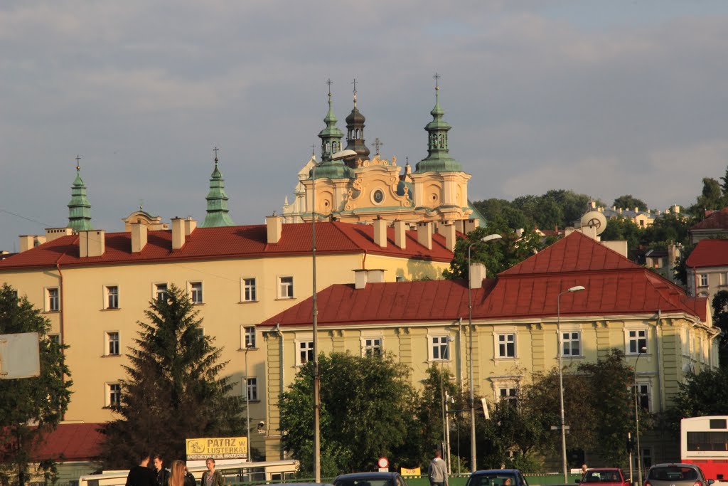 Old town in Przemyśl with the attic and towers of greek catholic cathedral church seen from the bridge over San river by Loton4