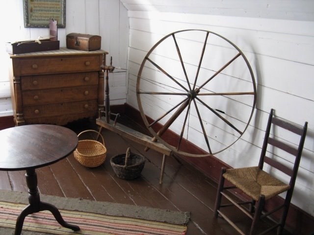 New Ross, N.S. - A spinning wheel and some other original 1800's furnishings at the Ross Farm Museum by jonfromnsca