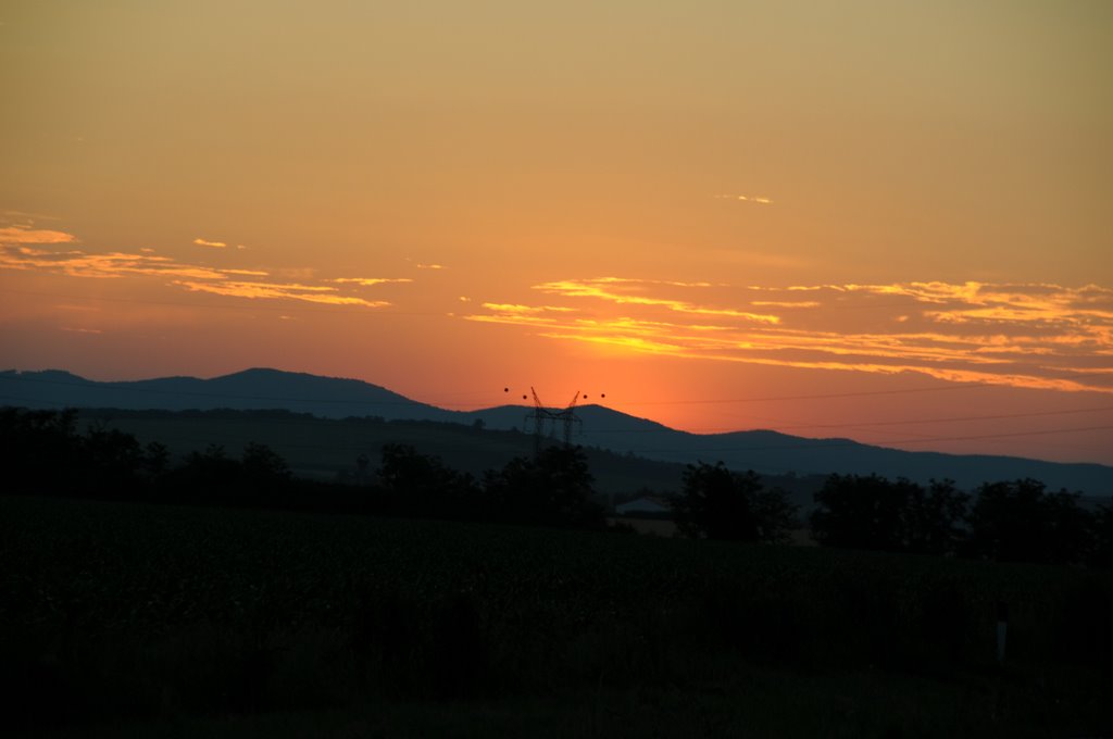 Sunset from the car by Roberta J. Pratt