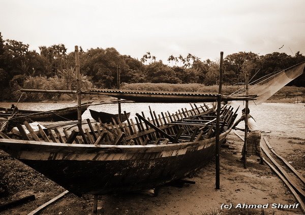 Boat Building on the Padma River, Manikganj, Dhaka, Bangladesh by Ahmed Sharif