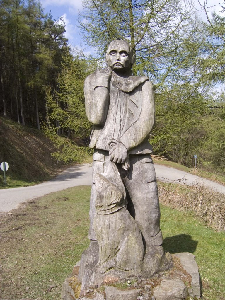 Wooden man and dog, Cwmcarn Forest Drive by barrington womble