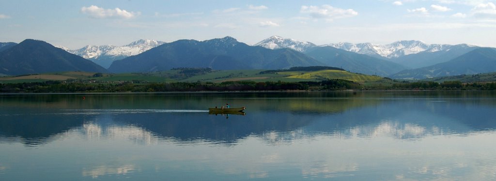 Liptovska Mara, view of the Low Tatra mountains by Wojciech Basza