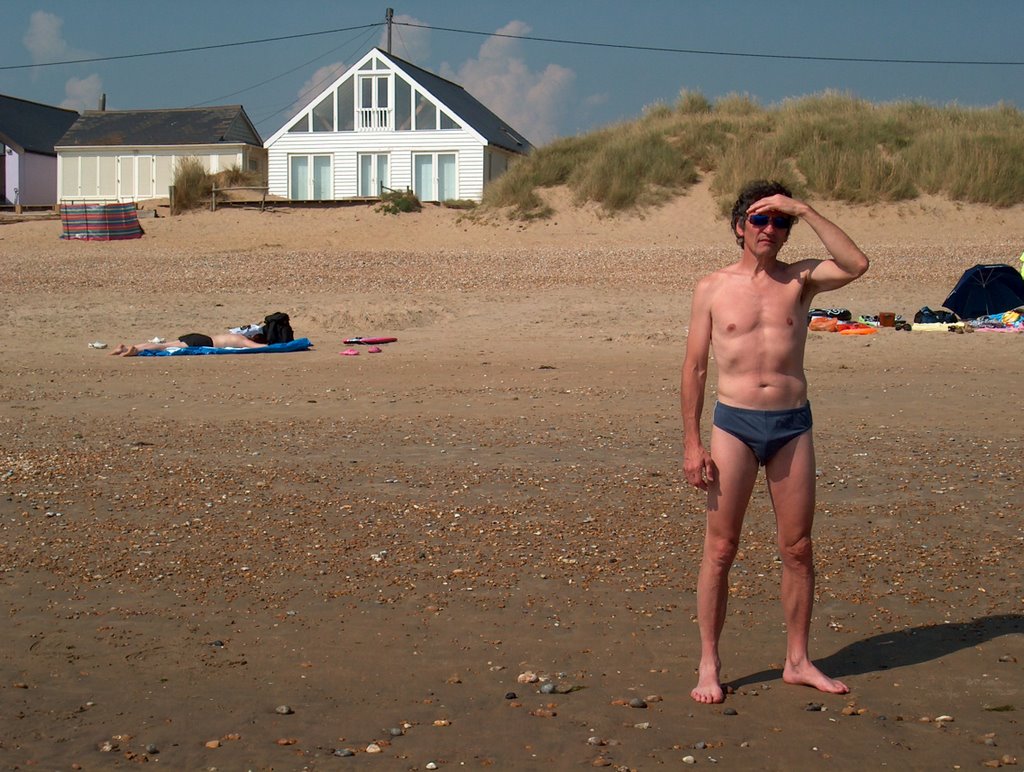 Dada on beach by white house by Bonx