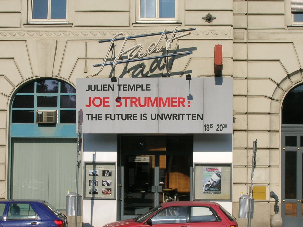 A cinema at Schwarzenberg platz playing Joe Strummer's memorial movie by Dobos